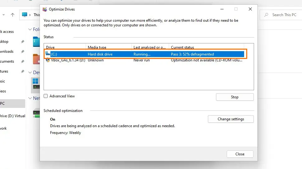 Windows will defragment and optimize your hard drive